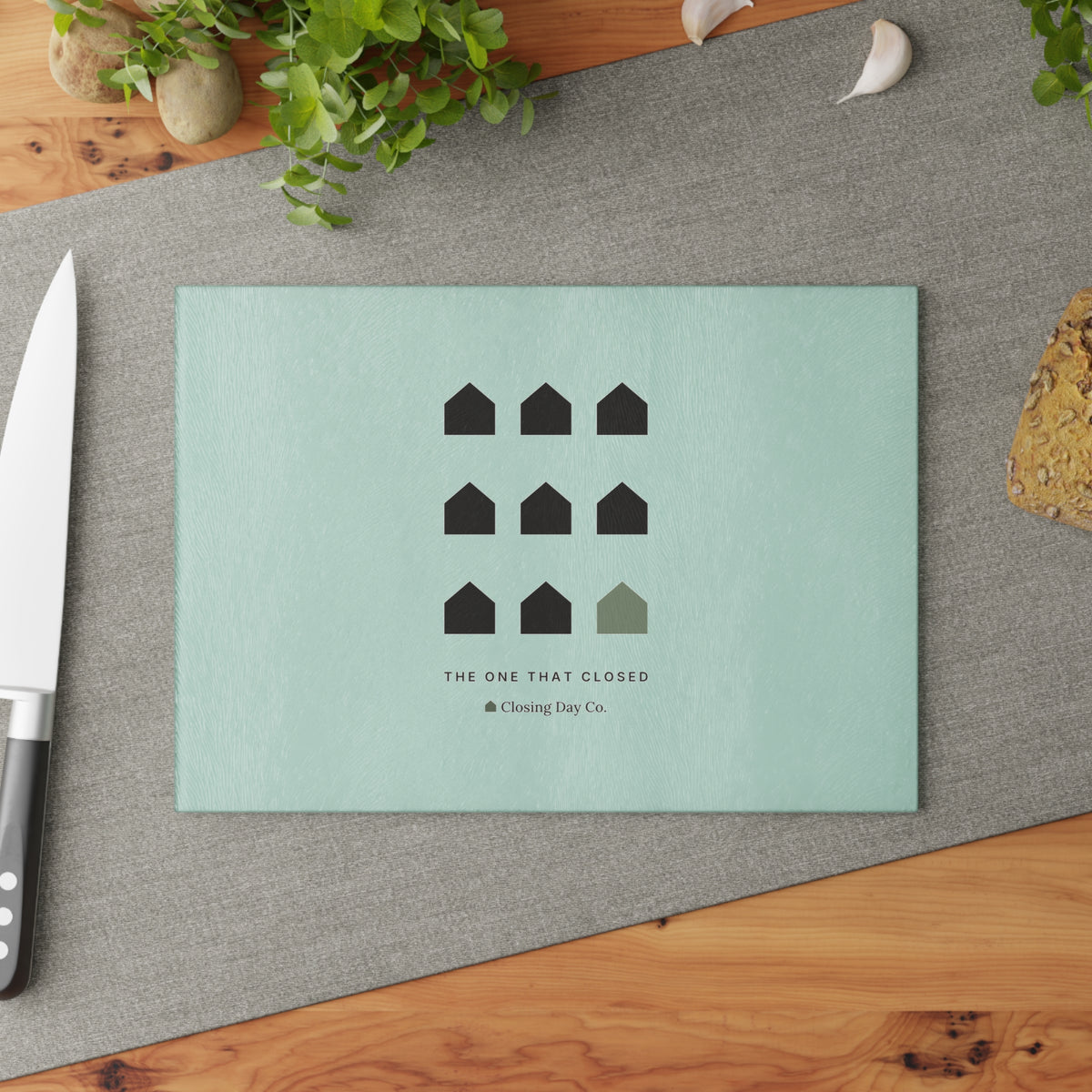 The One That Closed glass cutting board by Closing Day Co.